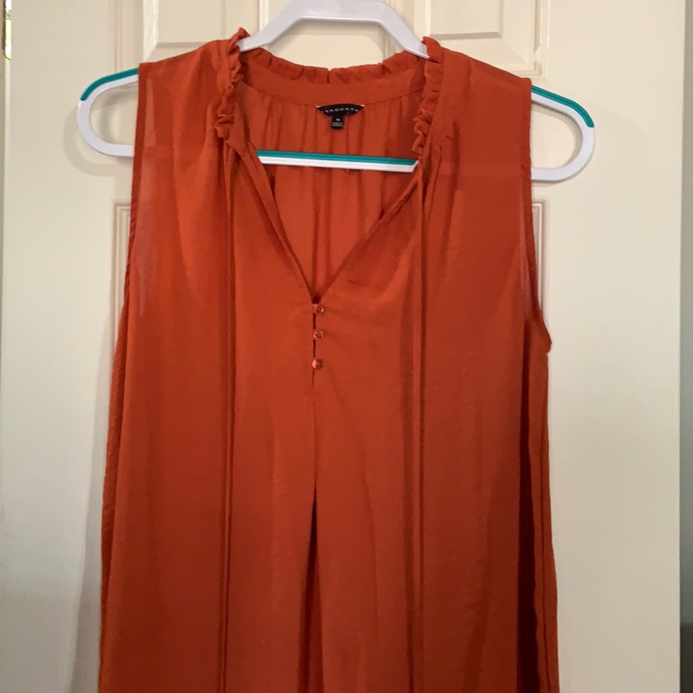 Rust colored sleeveless top